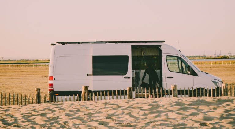 Camper van parked at a beach