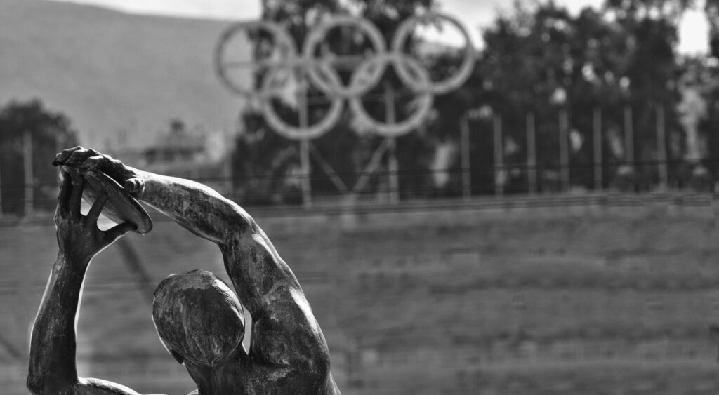 Olympic Statue with Olympic Rings in the background